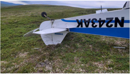 Photograph 2 – View of Accident Airplane Tail, from the NTSB investigation of Piper PA-18-150 accident near Koliganek, Alaska, July 9, 2024