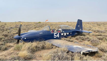Photograph 1 – View of the left side of the airplane where it came to rest., from the NTSB investigation of Amateur-built SUPER RV8 accident near Carter, Wyoming, July 27, 2024