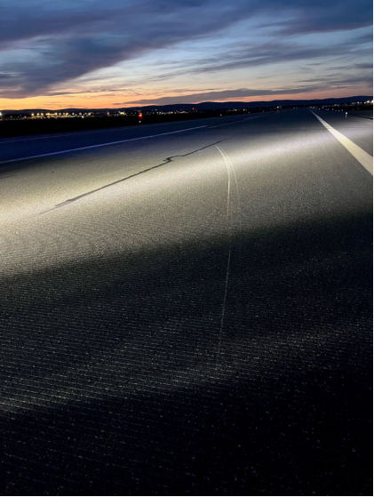 Photograph 2 – Impact mark on runway, from the NTSB investigation of Piper PA31 accident near Fairbanks, Alaska, August 5, 2024