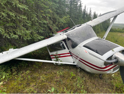 Photograph 1 – Front view of accident airplane at accident site, from the NTSB investigation of Cessna A185F accident near Fairbanks, Alaska, August 8, 2024
