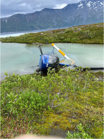 Photograph 5 – Front view of accident helicopter at accident site, from the NTSB investigation of Robinson Helicopter Company R44 II accident near Palmer, Alaska, August 18, 2024