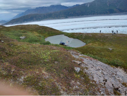 Photograph 6 - View of accident helicopter at accident site, from the NTSB investigation of Robinson Helicopter Company R44 II accident near Palmer, Alaska, August 18, 2024
