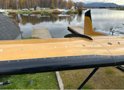 Photograph 2 – View of the top of the right wing missing vortex generators, from the NTSB investigation of Cessna 180B accident near Anchorage, Alaska, September 14, 2024