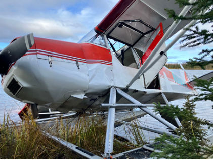 Photograph 1 – View of left side of accident airplane, from the NTSB investigation of Piper PA-22-150 accident near Bettles, Alaska, September 21, 2024