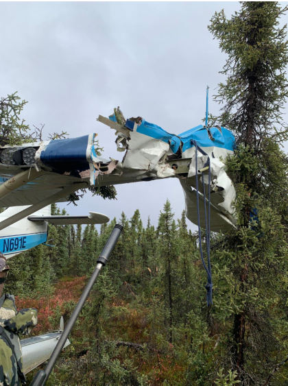 Photograph 2 – Left wing damage on accident airplane, from the NTSB investigation of Stinson 108-3 accident near Lime Village, Alaska, September 14, 2024
