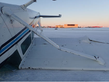Photograph 2 – Image of right wing, fuselage, and empennage, from the NTSB investigation of Cessna 172N accident near Anchorage, Alaska, December 31, 2024