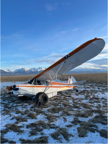 Photograph 1 – Left side of accident airplane, from the NTSB investigation of Piper PA-18-150 accident near Wasilla, Alaska, February 21, 2025