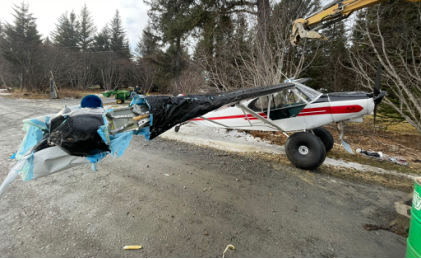 Photograph 2 – Right side of accident airplane during recovery, from the NTSB investigation of Piper PA-18-150 accident near Anchor Point, Alaska, February 28, 2025