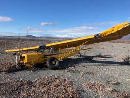 Photograph 1 – Accident airplane at accident site, from the NTSB investigation of Piper PA-18-150 accident near Palmer, Alaska, March 2, 2025