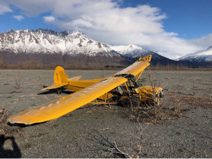 Photograph 2 – Accident airplane at accident site, from the NTSB investigation of Piper PA-18-150 accident near Palmer, Alaska, March 2, 2025