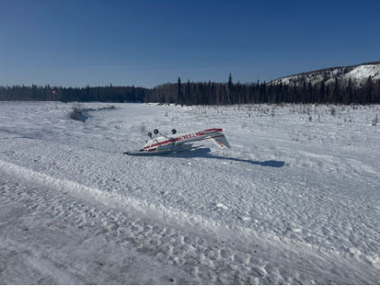 Photograph 1 – Accident airplane inverted, from the NTSB investigation of Cessna 172N accident near Manley Hot Springs, Alaska, March 29, 2025