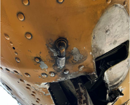 Photograph 2 – Damage to landing gear box assembly, from the NTSB investigation of Cessna A185F accident near Skwentna, Alaska, March 7, 2025
