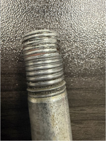Photograph 5 – Bolt from landing gear assembly, from the NTSB investigation of Cessna A185F accident near Skwentna, Alaska, March 7, 2025