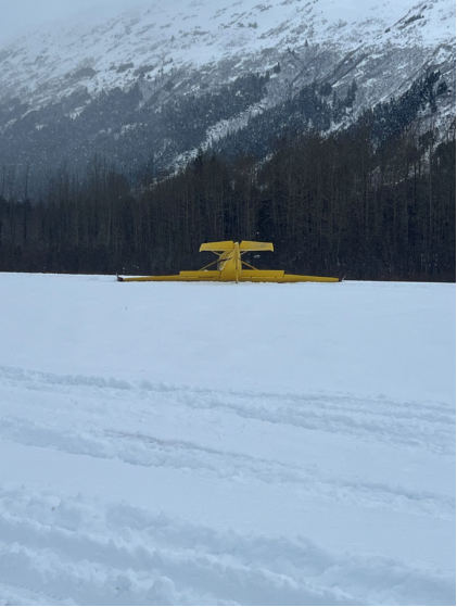 Photograph 4 - Accident airplane at accident site, from the NTSB investigation of Cessna 182B accident near Girdwood, Alaska, April 12, 2025