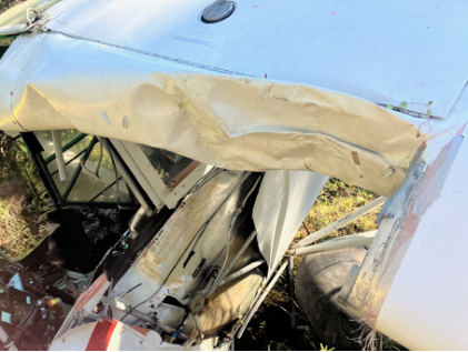 Photograph 2 – Image of damage to left wing and fuselage, from the NTSB investigation of Piper PA-12 accident near Fairbanks, Alaska, June 14, 2025