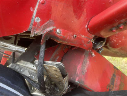 Photograph 2 – Main landing gear spring to fuselage attach point, from the NTSB investigation of Cessna 170B accident near Denali Park, Alaska, June 25, 2025