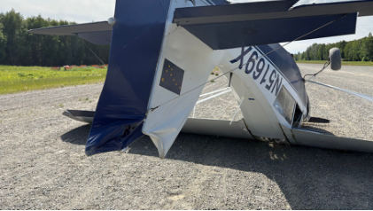 Photograph 1 – View of accident airplane at accident site, from the NTSB investigation of Champion 7ECA accident near Wasilla, Alaska, July 2, 2025