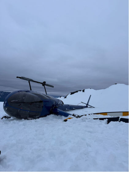 Photograph 1 – Accident helicopter at accident site, from the NTSB investigation of Robinson Helicopter Company R44 II accident near Palmer, Alaska, June 30, 2025