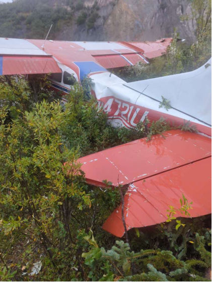 Photograph 1 – Image of horizonal stabilizer, wings, and fuselage, from the NTSB investigation of Cessna 180G accident near Delta Junction, Alaska, August 19, 2025