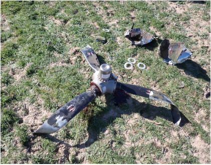 Photograph 9 – Left propeller, from the NTSB investigation of Cessna 310R accident near Poolville, Texas, January 14, 2024