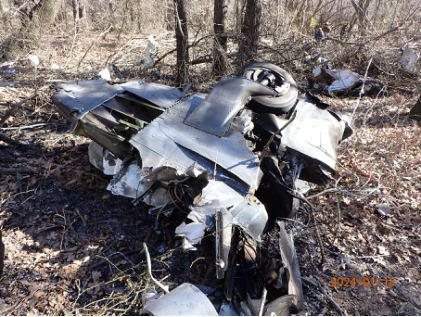 Photograph 6 – Landing gear, from the NTSB investigation of Cessna 310R accident near Poolville, Texas, January 14, 2024