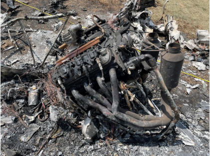 Photograph 7 – View of the engine at the accident site, from the NTSB investigation of Vertical Aviation Technologies Hummingbird accident near Spring Branch, Texas, April 29, 2024