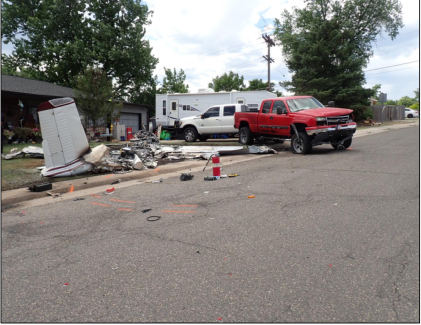 Photograph 2 – Accident site, from the NTSB investigation of Beech V35A accident near Arvada, Colorado, June 7, 2024