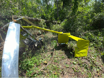 Photograph 3 – Tail boom and tail surfaces (NTSB Photo), from the NTSB investigation of Amateur-built DeBird accident near Napoleon, Michigan, August 4, 2024
