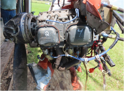 PG 5 Photograph 4 – Left Side View of Engine, from the NTSB investigation of Cessna 172F accident near Brazoria, Texas, August 6, 2024