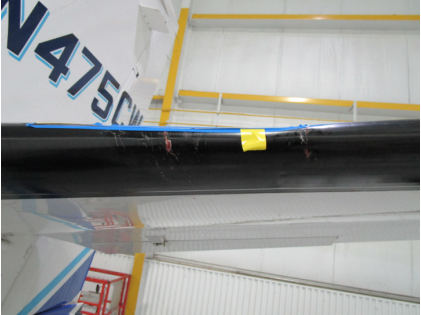 Photograph 1 – Left Horizontal Stabilizer Damage, from the NTSB investigation of Cessna 560XL accident near Council Bluffs, Iowa, November 26, 2023