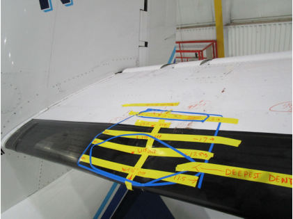 Photograph 2 – Upper Surface Damage of Left Horizontal Stabilizer, from the NTSB investigation of Cessna 560XL accident near Council Bluffs, Iowa, November 26, 2023