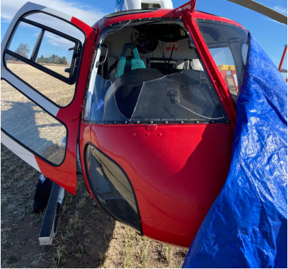Photograph 1 – Helicopter Canopy Damage, from the NTSB investigation of American Eurocopter CORP AS350B3 accident near Fort Morgan, Colorado, March 5, 2024