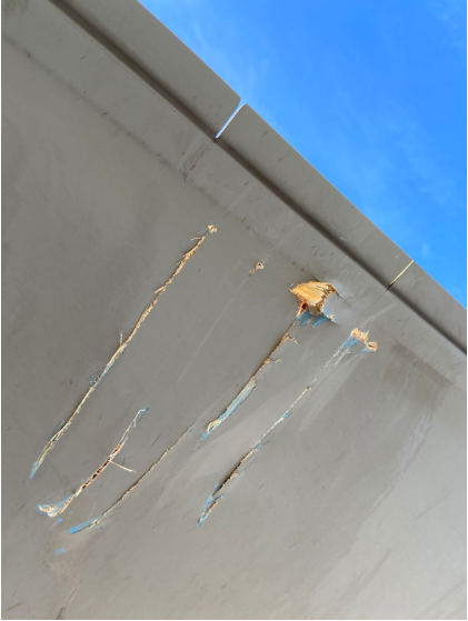 Photograph 2 – Yellow Rotor Blade Damage, from the NTSB investigation of American Eurocopter CORP AS350B3 accident near Fort Morgan, Colorado, March 5, 2024