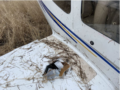PG 3 Photograph 2 – Right wing damage, from the NTSB investigation of Cirrus Design CORP SR20 accident near Aitkin, Minnesota, March 18, 2024