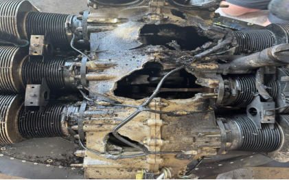Photograph 6 – Damage to Engine, from the NTSB investigation of Cessna T210 accident near San Saba, Texas, March 25, 2024