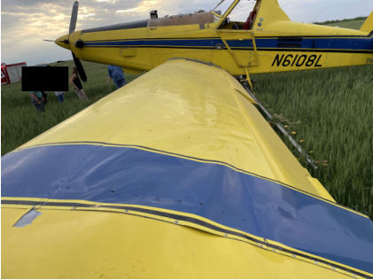 Photograph 3 – Left wing damage, from the NTSB investigation of Air Tractor INC AT-502B accident near Olney, Texas, April 24, 2024