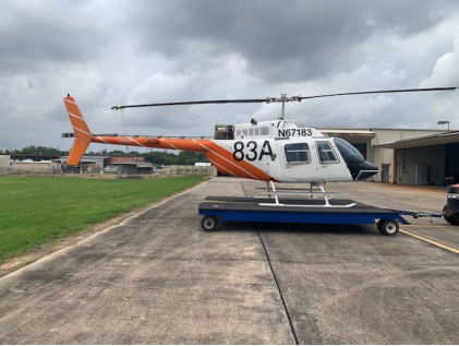 Photograph 1 – Helicopter after Recovery, from the NTSB investigation of Bell 206B accident near Baton Rouge, Louisiana, March 26, 2024
