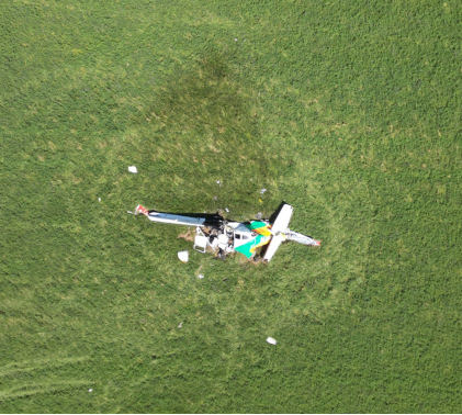 Photograph 2 – Aerial view of wreckage, from the NTSB investigation of Cessna U206 accident near Butler, Missouri, May 25, 2024
