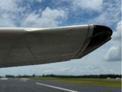 Photograph 2 – Forward outboard end of left wing, from the NTSB investigation of Cessna 172F accident near Ruston, Louisiana, June 19, 2024