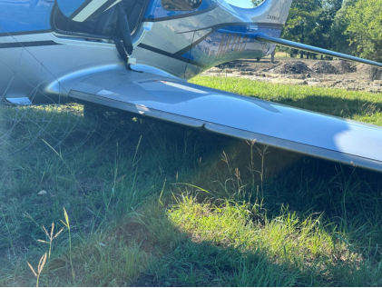 Photograph 3 – Left wing damage, from the NTSB investigation of Cirrus Design CORP SR22T accident near Boerne, Texas, June 23, 2024