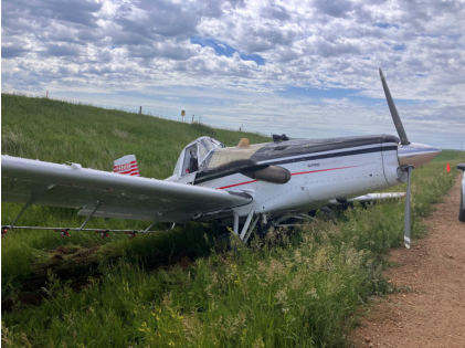 Photograph 3 – View of the right side of the airplane at the accident site, from the NTSB investigation of Thrush Aircraft INC S2R accident near Hebron, North Dakota, June 17, 2024