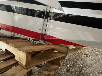 Photograph 6 – View of the substantial damage sustained to the rudder, from the NTSB investigation of Thrush Aircraft INC S2R accident near Hebron, North Dakota, June 17, 2024