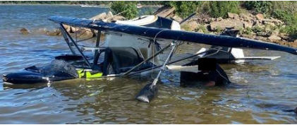 . Photograph 1 – Forward View of Accident Airplane Upright in Water, from the NTSB investigation of Progressive Aerodyne Searey accident near Stillwater, Oklahoma, July 6, 2024