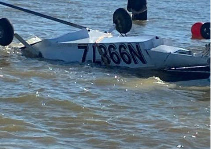 Photograph 2 – Accident Airplane Inverted in Water, from the NTSB investigation of Progressive Aerodyne Searey accident near Stillwater, Oklahoma, July 6, 2024