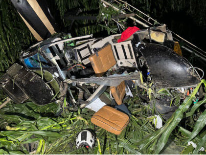 Photograph 1 – Helicopter in the Cornfield, from the NTSB investigation of Bell 206 accident near Cornland, Illinois, July 21, 2024