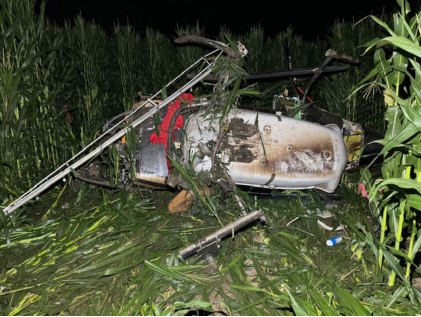 Photograph 2 – Helicopter in the Cornfield, from the NTSB investigation of Bell 206 accident near Cornland, Illinois, July 21, 2024