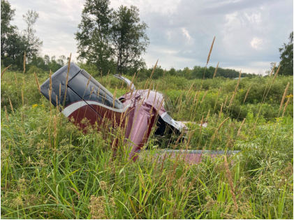 Photograph 2 – View of the rear of the airplane at the accident site, from the NTSB investigation of Piper PA46 accident near Radisson, Wisconsin, July 28, 2024