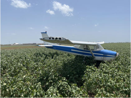 Photo 1 – Airplane at accident site, right, from the NTSB investigation of Cessna 150F accident near Castroville, Texas, July 31, 2024