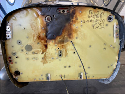 Photograph 6: Firewall Damage, from the NTSB investigation of Cirrus Design CORP SR22T incident near Tulsa, Oklahoma, August 3, 2024