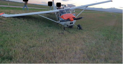 Photograph 1 – View of the front of the airplane at the accident site, from the NTSB investigation of Cessna A185 accident near Loveland, Colorado, August 20, 2024